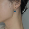 Lade das Bild in den Galerie-Viewer, Ozeanische Weisheit Ohrringe mit blauem Tigerauge und Perlen