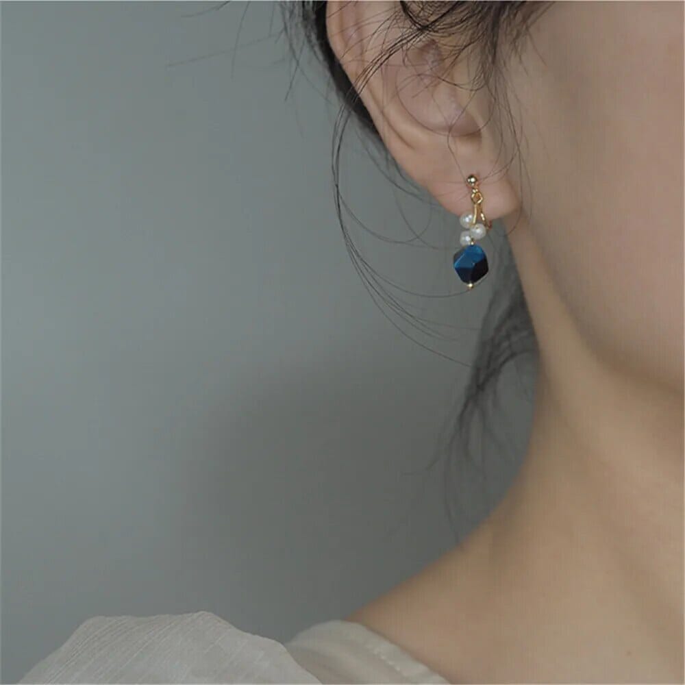Ozeanische Weisheit Ohrringe mit blauem Tigerauge und Perlen